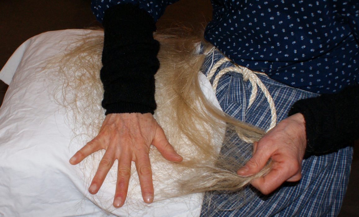 Preparing to dress the distaff