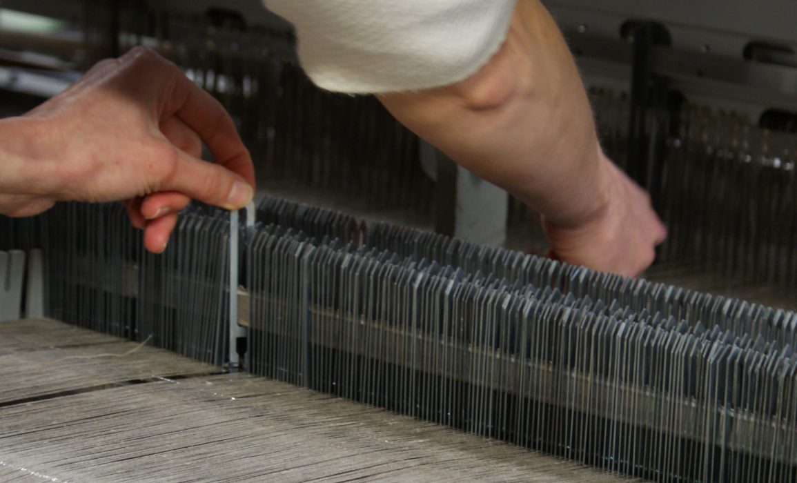 tending to the warp thread
