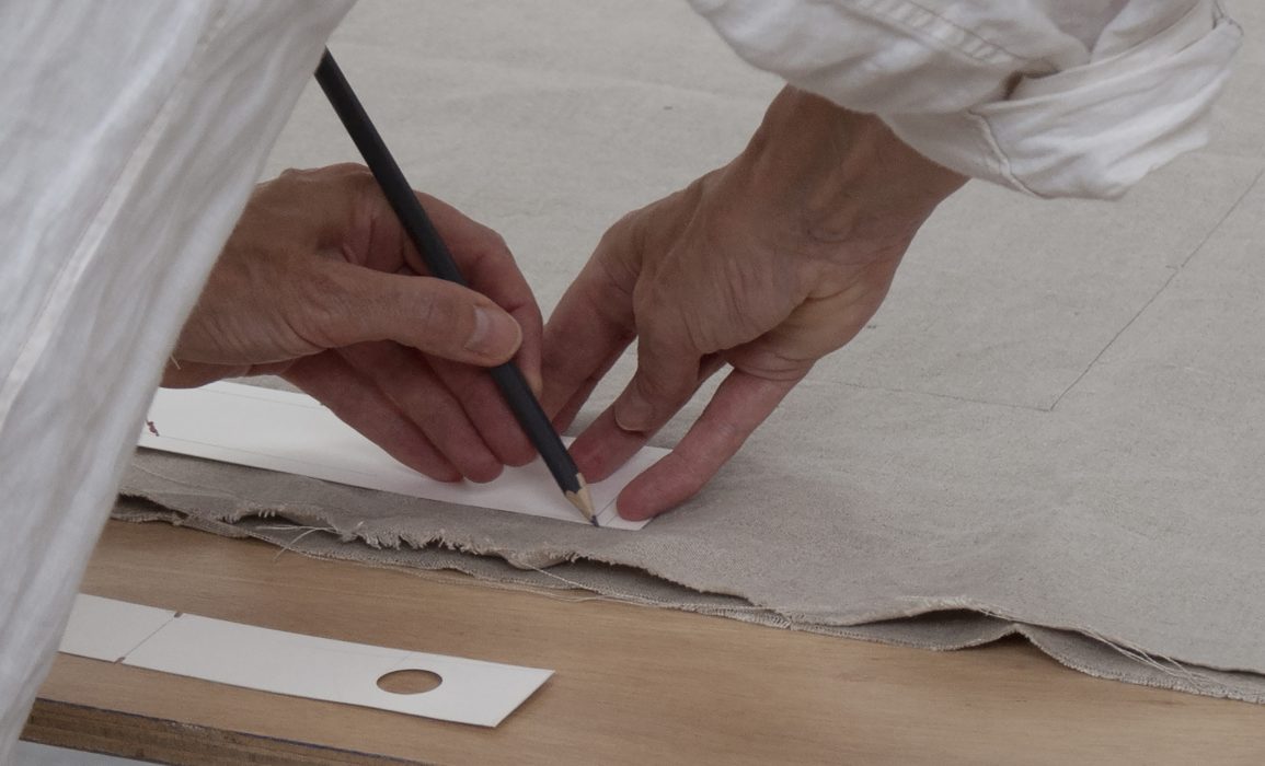 tracing block pattern pieces onto the fabric
